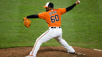 BALTIMORE, MD - AUGUST 22: Mychal Givens #60 of the Baltimore Orioles pitches against the Boston Red Sox during the seventh inning at Oriole Park at Camden Yards on August 22, 2020 in Baltimore, Maryland. (Photo by Scott Taetsch/Getty Images)
