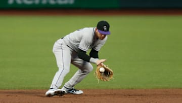 SAN FRANCISCO, CALIFORNIA - SEPTEMBER 22: Trevor Story #27 of the Colorado Rockies fields the ball against the San Francisco Giants at Oracle Park on September 22, 2020 in San Francisco, California. (Photo by Lachlan Cunningham/Getty Images)