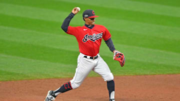 CLEVELAND, OHIO - SEPTEMBER 30: Shortstop Francisco Lindor #12 of the Cleveland Indians throws out DJ LeMahieu #26 of the New York Yankees at first during the sixth inning of Game Two of the American League Wild Card Series at Progressive Field on September 30, 2020 in Cleveland, Ohio. The Yankees defeated the Indians 10-9. (Photo by Jason Miller/Getty Images)