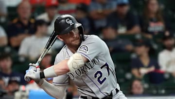 HOUSTON, TEXAS - AUGUST 11: Trevor Story #27 of the Colorado Rockies during action against the Houston Astros at Minute Maid Park on August 11, 2021 in Houston, Texas. (Photo by Bob Levey/Getty Images)