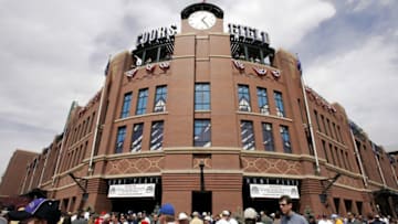 DENVER - APRIL 4: Fans pour into Coors Field for opening day for a game between the San Diego Padres and the Colorado Rockies on April 4, 2005 in Denver, Colorado. (Photo by Brian Bahr/Getty Images)