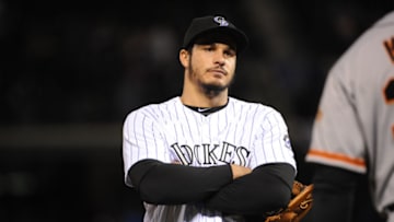 DENVER, CO - MAY 27: Nolan Arenado of the Colorado Rockies reacts to a play against the San Francisco Giants at Coors Field on May 27, 2016 in Denver, Colorado. The Rockies defeated the Giants 5-2 (Photo by Bart Young/Getty Images)