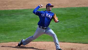 PHOENIX, AZ - MARCH 04: Chi Chi Gonzalez #21 of the Texas Rangers delivers a pitch in the third inning of the spring training game against Milwaukee Brewers at Maryvale Baseball Park on March 4, 2017 in Phoenix, Arizona. (Photo by Jennifer Stewart/Getty Images)
