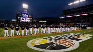 DENVER - OCTOBER 27: The Colorado Rockies line up during pregame festivities against the Boston Red Sox during Game Three of the 2007 Major League Baseball World Series at Coors Field on October 27, 2007 in Denver, Colorado. (Photo by Pool/Getty Images)