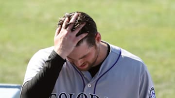 LOS ANGELES, CA - JUNE 25: Pitcher Adam Ottavino #0 of the Colorado Rockies reacts as he walks to the dugout after throwing wild pitches to score runs and give up the lead against the Los Angeles Dodgers during the seventh inning of the baseball game at Dodger Stadium June 25, 2017, in Los Angeles, California. (Photo by Kevork Djansezian/Getty Images)