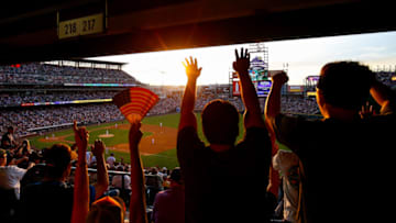 DENVER, CO - JULY 4: Fans participate in the wave during the sixth inning of a game between the Cincinnati Reds and Colorado Rockies at Coors Field on July 4, 2017 in Denver, Colorado. The Reds defeated the Rockies 8-1. (Photo by Justin Edmonds/Getty Images)