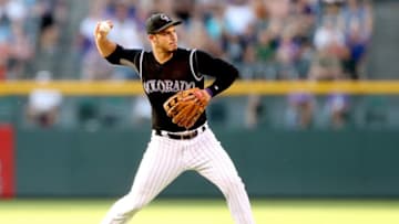 DENVER, CO - JULY 08: Nolan Arenado #28 of the Colorado Rockies throws out Melky Cabrera #53 of the Chicago White Sox in the first inning at Coors Field on July 8, 2017 in Denver, Colorado. (Photo by Matthew Stockman/Getty Images)