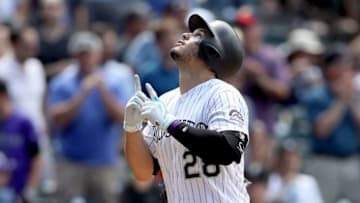 DENVER, CO - JULY 19: Nolan Arenado #28 of the Colorado Rockies scores after hitting a home run in the fourth inning against the San Diego Padres at Coors Field on July 19, 2017 in Denver, Colorado. (Photo by Matthew Stockman/Getty Images)