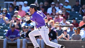 SCOTTSDALE, AZ - MARCH 12: Mike Tauchman #3 of the Colorado Rockies follows through on a swing during the first inning of a spring training game against the Arizona Diamondbacks at Salt River Fields at Talking Stick on March 12, 2018 in Scottsdale, Arizona. (Photo by Norm Hall/Getty Images)