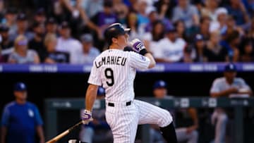 DENVER, CO - JUNE 1: DJ LeMahieu #9 of the Colorado Rockies watches his RBI single during the second inning against the Los Angeles Dodgers at Coors Field on June 1, 2018 in Denver, Colorado. (Photo by Justin Edmonds/Getty Images)