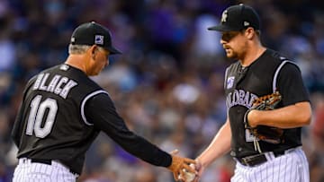 DENVER, CO - JUNE 9: Bud Black #10 of the Colorado Rockies relieves Bryan Shaw #29 after Shaw gave up 6 runs (1 earned) in the eighth inning of a game against the Arizona Diamondbacks at Coors Field on June 9, 2018 in Denver, Colorado. (Photo by Dustin Bradford/Getty Images)