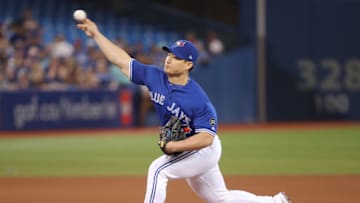 TORONTO, ON - JULY 2: Seunghwan Oh #22 of the Toronto Blue Jays delivers a pitch in the tenth inning during MLB game action against the Detroit Tigers at Rogers Centre on July 2, 2018 in Toronto, Canada. (Photo by Tom Szczerbowski/Getty Images)