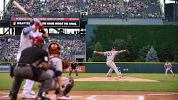 DENVER, CO - JULY 2: Madison Bumgarner #40 of the San Francisco Giants pitches against Trevor Story #27 of the Colorado Rockies in the first inning of a game at Coors Field on July 2, 2018 in Denver, Colorado. (Photo by Dustin Bradford/Getty Images)