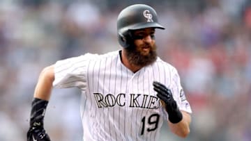 DENVER, CO - AUGUST 05: Charlie Blackmon #19 of the Colorado Rockies scores on a Gerardo Parra single in the first inning against the Philadelphia Phillies at Coors Field on August 5, 2017 in Denver, Colorado. (Photo by Matthew Stockman/Getty Images)