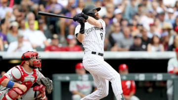 DENVER, CO - AUGUST 06: Charlie Blackmon #19 of the Colorado Rockies his a RBI double in the seventh inning against the Philadelphia Phillies at Coors Field on August 6, 2017 in Denver, Colorado. (Photo by Matthew Stockman/Getty Images)