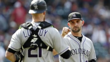 CLEVELAND, OH - AUGUST 09: Tyler Chatwood #32 and Jonathan Lucroy #21 of the Colorado Rockies celebrate after defeating the Cleveland Indians in 12 innings at Progressive Field on August 9, 2017 in Cleveland, Ohio. (Photo by David Maxwell/Getty Images)