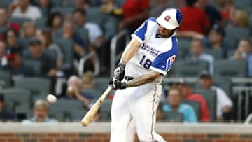 ATLANTA, GA - AUGUST 18: Left fielder Matt Adams #18 of the Atlanta Braves hits a solo home run in the second inning during the game against the Cincinnati Reds at SunTrust Park on August 18, 2017 in Atlanta, Georgia. (Photo by Mike Zarrilli/Getty Images)