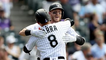 DENVER, CO - JULY 19: Trevor Story #27 of the Colorado Rockies is congratulated by Gerardo Parra #8 after hitting a 2 RBI home run in the fourth inning against the San Diego Padres at Coors Field on July 19, 2017 in Denver, Colorado. (Photo by Matthew Stockman/Getty Images)