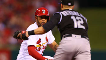 ST. LOUIS, MO - JULY 26: Tommy Pham #28 of the St. Louis Cardinals is caught in a rundown against the Colorado Rockies in the third inning at Busch Stadium on July 26, 2017 in St. Louis, Missouri. (Photo by Dilip Vishwanat/Getty Images)