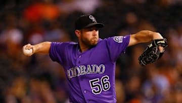 DENVER, CO - AUGUST 28: Relief pitcher Greg Holland #56 of the Colorado Rockies delivers to home plate against the Detroit Tigers during the ninth inning of an interleague game at Coors Field on August 28, 2017 in Denver, Colorado. (Photo by Justin Edmonds/Getty Images)