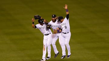 DENVER, CO - AUGUST 29: (L-R) Ian Desmond #20, Charlie Blackmon #19 and Gerardo Parra #8 of the Colorado Rockies celebrate the Rockies 7-3 win against the Detroit Tigers following an interleague game at Coors Field on August 29, 2017 in Denver, Colorado. (Photo by Justin Edmonds/Getty Images)