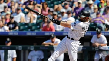 DENVER, CO - SEPTEMBER 03: Charlie Blackmon #19 of the Colorado Rockies hits a RBI single against the Arizona Diamondbacks in the fifth inning at Coors Field on September 3, 2017 in Denver, Colorado. (Photo by Joe Mahoney/Getty Images)