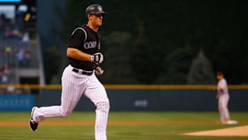 DENVER, CO - SEPTEMBER 5: DJ LeMahieu #9 of the Colorado Rockies runs towards home on his way to scoring on a sacrifice fly off the bat of Gerardo Parra during the first inning against the San Francisco Giants at Coors Field on September 5, 2017 in Denver, Colorado. (Photo by Justin Edmonds/Getty Images)