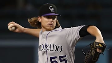 LOS ANGELES, CA - SEPTEMBER 07: Pitcher Jon Gray #55 of the Colorado Rockies pitches during the first inning of the MLB game against the Los Angeles Dodgers at Dodger Stadium on September 7, 2017 in Los Angeles, California. (Photo by Victor Decolongon/Getty Images)