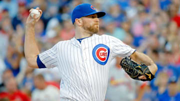 CHICAGO, IL - SEPTEMBER 16: Wade Davis #71 of the Chicago Cubs pitches against the St. Louis Cardinals during the ninth inning at Wrigley Field on September 16, 2017 in Chicago, Illinois. The Chicago Cubs won 4-1. (Photo by Jon Durr/Getty Images)