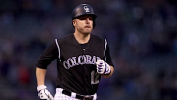 DENVER, CO - SEPTEMBER 29: Mark Reynolds #12 of the Colorado Rockies circles the bases after hitting a 2 RBI home run in the first inning against the Los Angeles Dodgers at Coors Field on September 29, 2017 in Denver, Colorado. (Photo by Matthew Stockman/Getty Images)