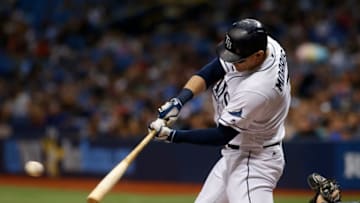 ST. PETERSBURG, FL - AUGUST 4: Logan Morrison #7 of the Tampa Bay Rays hits a single off of pitcher Brandon Woodruff of the Milwaukee Brewers during the first inning of a game on August 4, 2017 at Tropicana Field in St. Petersburg, Florida. (Photo by Brian Blanco/Getty Images)