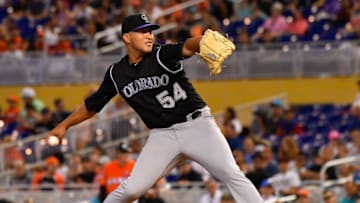 MIAMI, FL - AUGUST 13: Carlos Estevez #54 of the Colorado Rockies pitches in the eighth inning during the game between the Miami Marlins and the Colorado Rockies at Marlins Park on August 13, 2017 in Miami, Florida. (Photo by Mark Brown/Getty Images)