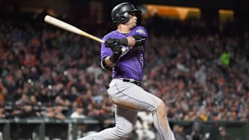 SAN FRANCISCO, CA - SEPTEMBER 19: Gerardo Parra #8 of the Colorado Rockies hits an rbi double scoring Carlos Gonzalez #5 against the San Francisco Giants in the top of the eighth inning at AT&T Park on September 19, 2017 in San Francisco, California. (Photo by Thearon W. Henderson/Getty Images)