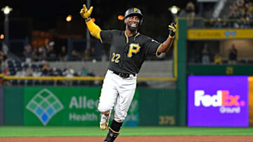 PITTSBURGH, PA - SEPTEMBER 26: Andrew McCutchen #22 of the Pittsburgh Pirates reacts as he rounds the bases after hitting a grand slam home run in the second inning during the game against the Baltimore Orioles at PNC Park on September 26, 2017 in Pittsburgh, Pennsylvania. The grand slam home run was the first of McCutchen's career. (Photo by Justin Berl/Getty Images)
