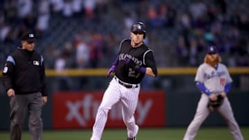 DENVER, CO - SEPTEMBER 29: Trevor Story #27 of the Colorado Rockies circles the bases to score on a Mark Reynolds 2 RBI home run in the first inning against the Los Angeles Dodgers at Coors Field on September 29, 2017 in Denver, Colorado. (Photo by Matthew Stockman/Getty Images)