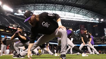 PHOENIX, AZ - OCTOBER 04: Charlie Blackmon #19 of the Colorado Rockies stretches before the start of the National League Wild Card game against the Arizona Diamondbacks at Chase Field on October 4, 2017 in Phoenix, Arizona. (Photo by Christian Petersen/Getty Images)