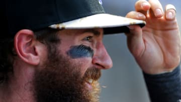 DENVER, CO - JULY 11: Charlie Blackmon #19 of the Colorado Rockies adjusts his hat during the during the seventh inning against the Atlanta Braves at Coors Field on July 11, 2015 in Denver, Colorado. The Rockies defeated the Braves 3-2. (Photo by Justin Edmonds/Getty Images)