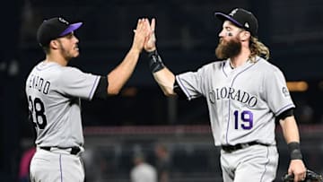 PITTSBURGH, PA - JUNE 14: Charlie Blackmon #19 of the Colorado Rockies high fives with Nolan Arenado #28 after the final out in the Colorado Rockies 5-1 win over the Pittsburgh Pirates at PNC Park on June 14, 2017 in Pittsburgh, Pennsylvania. (Photo by Justin Berl/Getty Images)