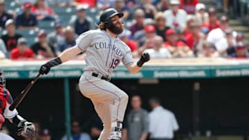 CLEVELAND, OH - AUGUST 09: Charlie Blackmon #19 of the Colorado Rockies singles against the Cleveland Indians in the tenth inning at Progressive Field on August 9, 2017 in Cleveland, Ohio. The Rockies defeated the Indians 3-2 in 12 innings. (Photo by David Maxwell/Getty Images)