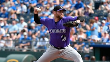 KANSAS CITY, MO - AUGUST 24: Adam Ottavino #0 of the Colorado Rockies throws in the eighth inning Kansas City Royals at Kauffman Stadium on August 24, 2017 in Kansas City, Missouri. (Photo by Ed Zurga/Getty Images)