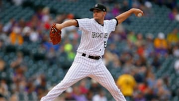 DENVER, CO - SEPTEMBER 17: Chris Rusin #52 of the Colorado Rockies pitches during a regular season MLB game between the Colorado Rockies and the visiting San Diego Padres at Coors Field on September 17, 2017 in Denver, Colorado. (Photo by Russell Lansford/Getty Images)