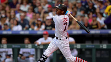 DENVER, CO - JULY 03: Raimel Tapia #7 of the Colorado Rockies hits a third inning ground rule double against the Cincinnati Reds at Coors Field on July 3, 2017 in Denver, Colorado. (Photo by Dustin Bradford/Getty Images)