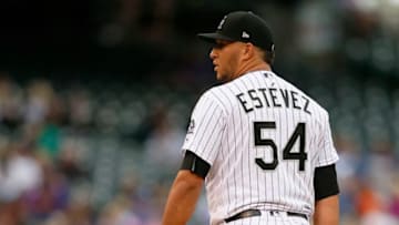 DENVER, CO - OCTOBER 01: Carlos Estevez #54 of the Colorado Rockies pitches during a regular season MLB game between the Colorado Rockies and the visiting Los Angeles Dodgers at Coors Field on October 1, 2017 in Denver, Colorado. (Photo by Russell Lansford/Getty Images)