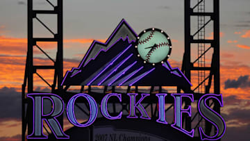 DENVER, CO - JULY 14: The sun sets over the stadium behind the scoreboard as the Milwaukee Brewers face the Colorado Rockies at Coors Field on July 14, 2011 in Denver, Colorado. The Rockies defeated the Brewers 12-3. (Photo by Doug Pensinger/Getty Images)