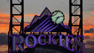 DENVER, CO - JULY 14: The sun sets over the stadium behind the scoreboard as the Milwaukee Brewers face the Colorado Rockies at Coors Field on July 14, 2011 in Denver, Colorado. The Rockies defeated the Brewers 12-3. (Photo by Doug Pensinger/Getty Images)