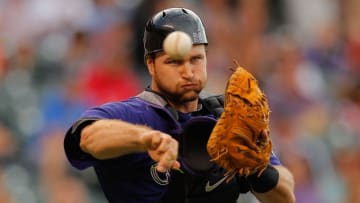 DENVER, CO - AUGUST 4: Chris Iannetta #20 of the Colorado Rockies throws out Ross Detwiler #48 of the Washington Nationals for the second out in the second inning at Coors Field on August 4, 2011 in Denver, Colorado. (Photo by Justin Edmonds/Getty Images)