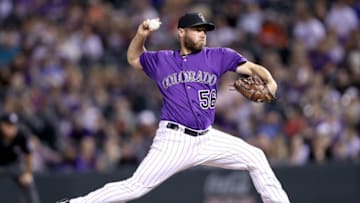 DENVER, CO - JULY 18: Greg Holland #56 of the Colorado Rockies throws in the ninth inning against the San Diego Padres at Coors Field on July 18, 2017 in Denver, Colorado. (Photo by Matthew Stockman/Getty Images)