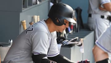 LOS ANGELES, CA - SEPTEMBER 10: Carlos Gonzalez #5 of the Colorado Rockies checks an iPad before going up to bat in the ninth inning of the game against the Los Angeles Dodgers at Dodger Stadium on September 10, 2017 in Los Angeles, California. (Photo by Jayne Kamin-Oncea/Getty Images)