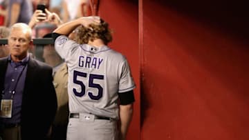 PHOENIX, AZ - OCTOBER 04: Jon Gray #55 of the Colorado Rockies walks in the dugout after being pulled from the game in the bottom of the second inning of the National League Wild Card game against the Arizona Diamondbacks at Chase Field on October 4, 2017 in Phoenix, Arizona. (Photo by Christian Petersen/Getty Images)