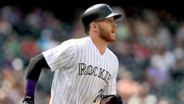 DENVER, CO - MAY 07: Trevor Story #27 of the Colorado Rockies hits a RBI double in the sixth inning against the Arizona Diamondbacks at Coors Field on May 7, 2017 in Denver, Colorado. (Photo by Matthew Stockman/Getty Images)